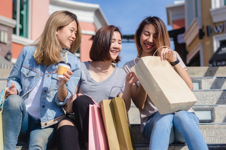 Friends with shopping bags